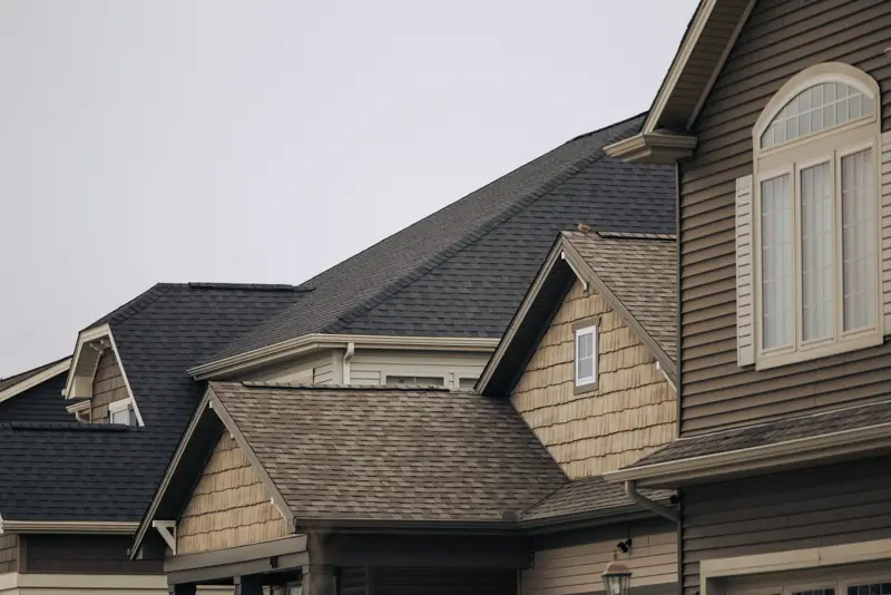 Roofer inspecting a roof